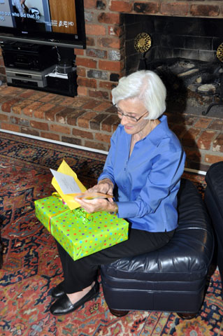 Susie Hudson opens a birthday present